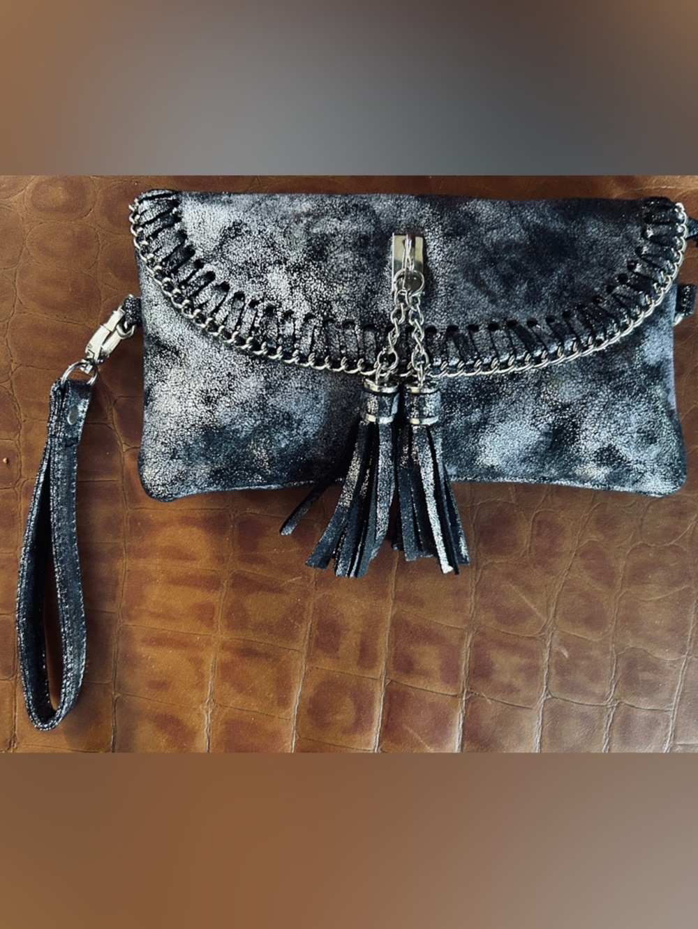 Sondra Roberts Marbleized wristlet with Tassels comes with long silver Chain.NWT